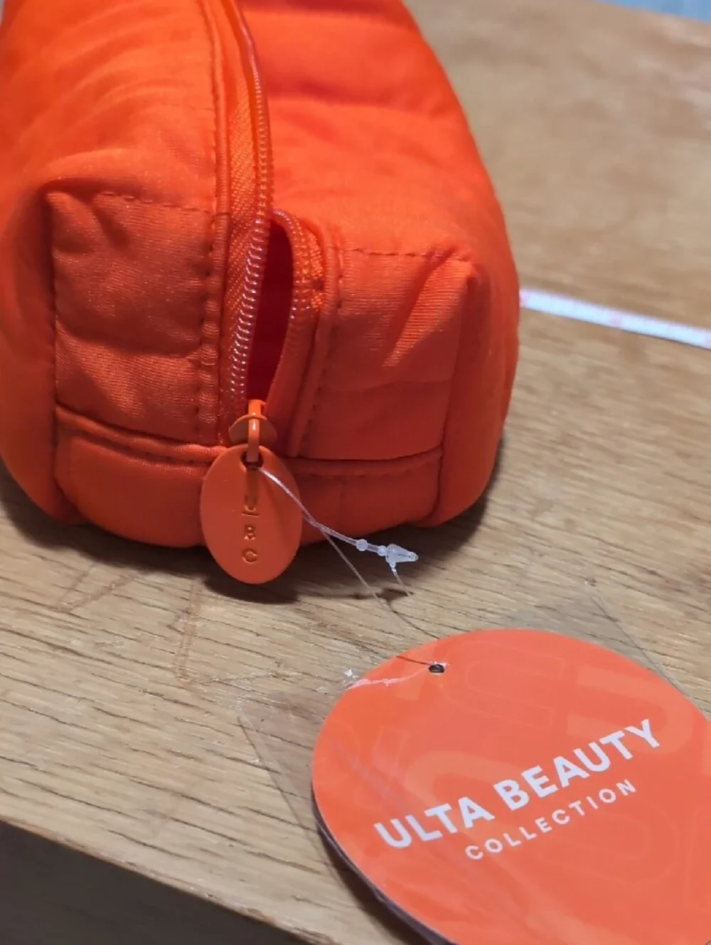 Ulta Beauty Bright Orange Quilted Cosmetic Bag